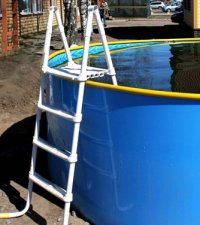 Permanent link to The Pool Ladder With Her Hands